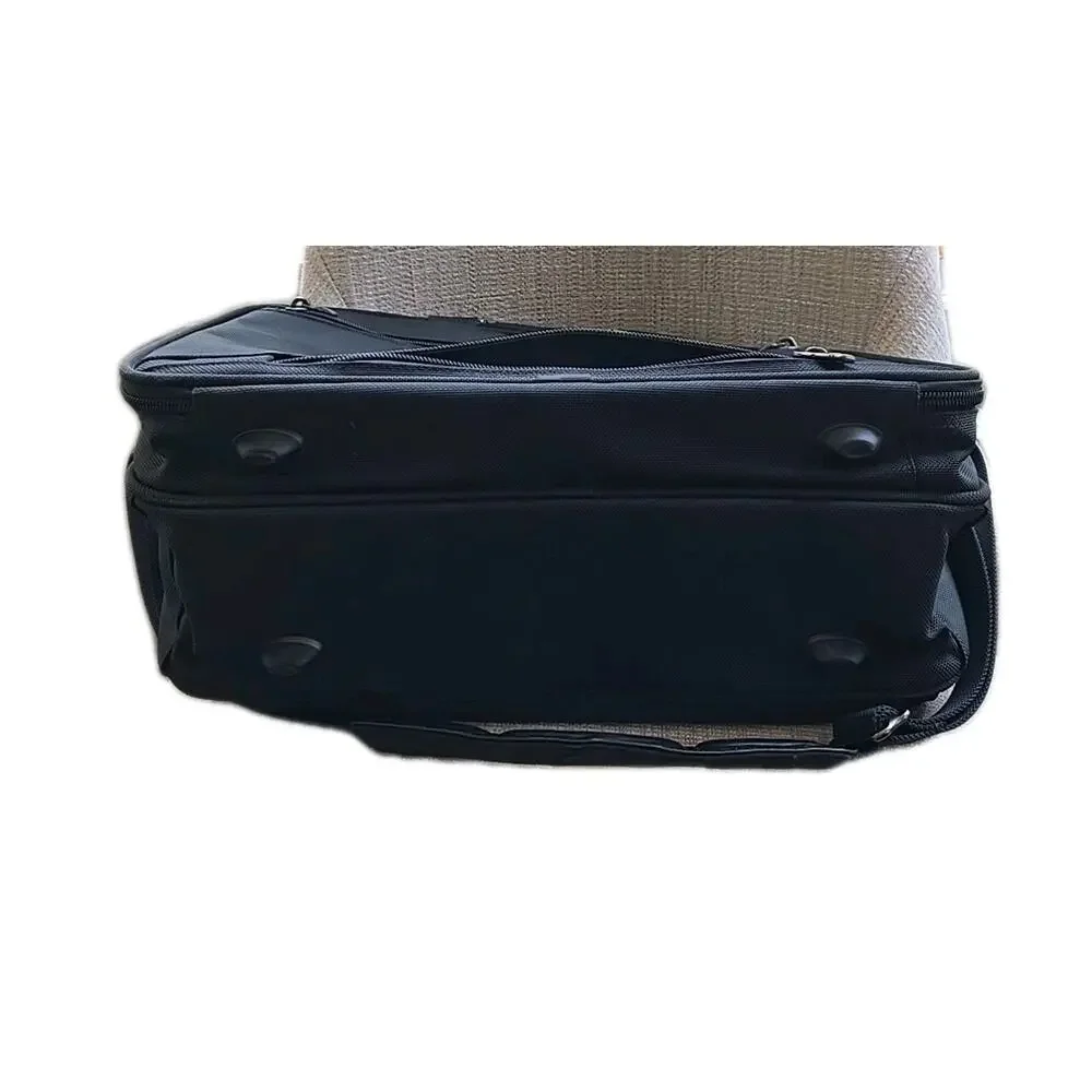 Tumi approx 17x12x8